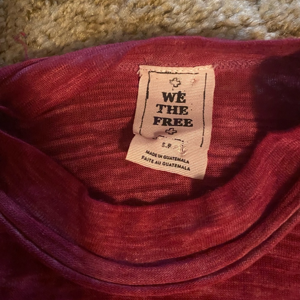 We the free distressed tank top